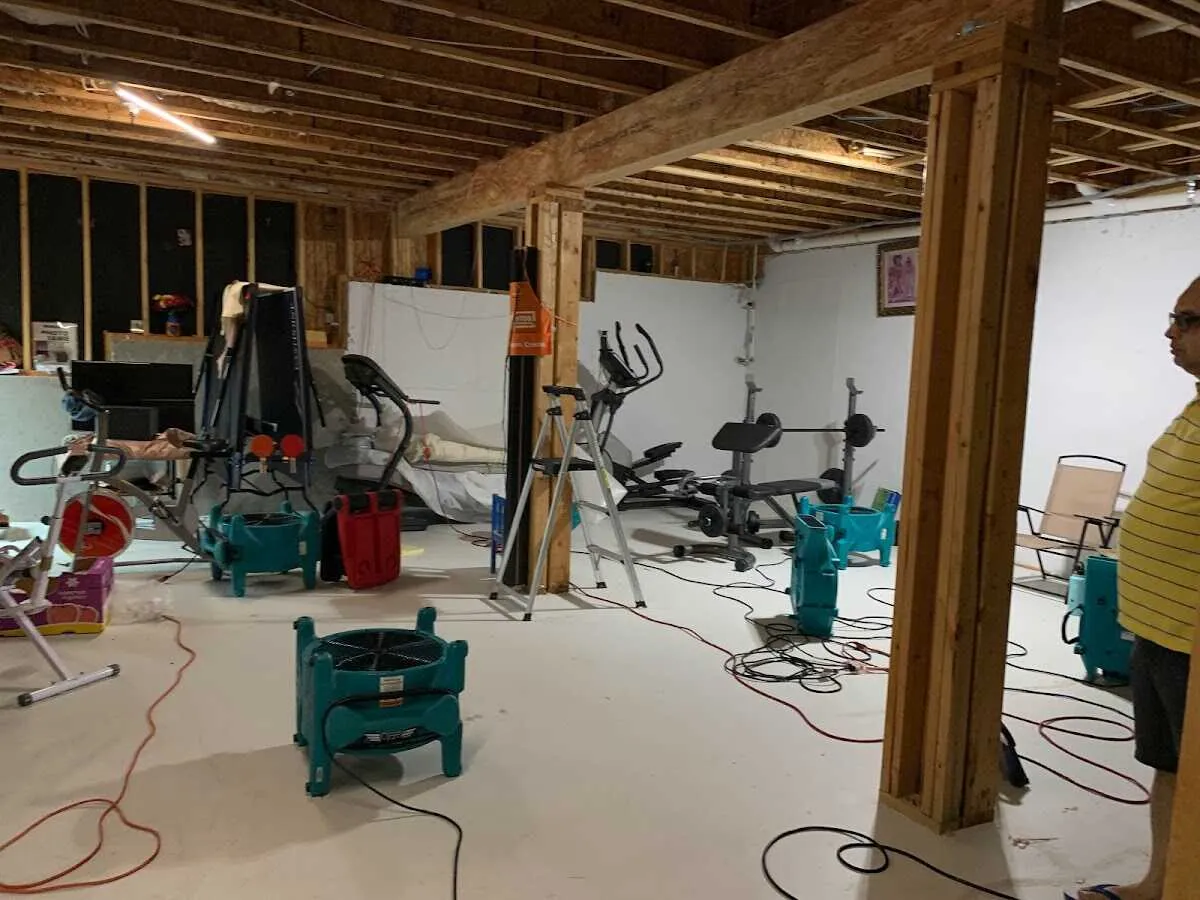 Basement drying equipment setup for Contents Cleaning & Restoration in Waveland
