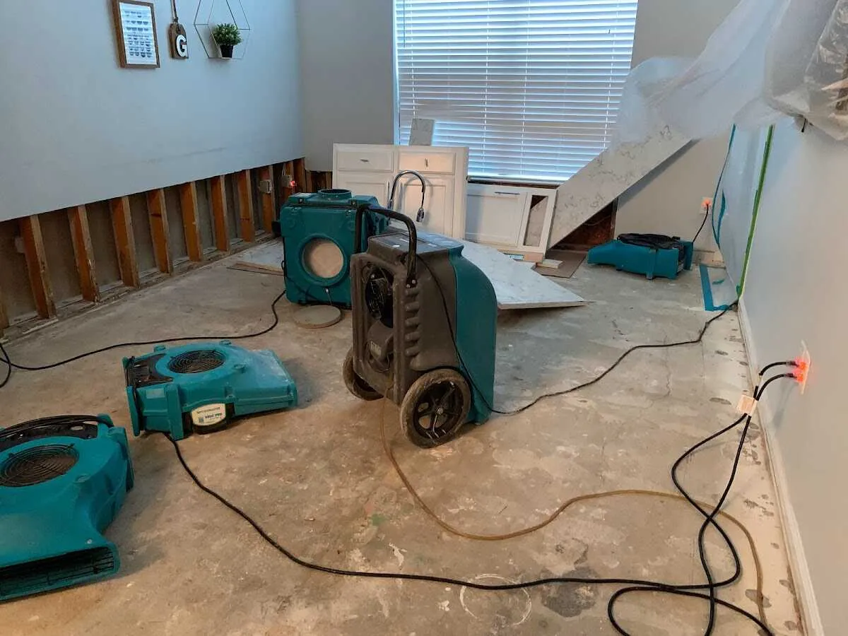 Dehumidifier in flood-cut room for Water Damage Restoration in Waveland