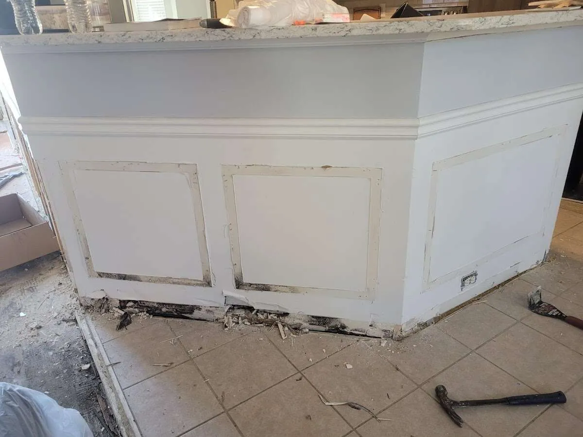 Water damage and mold on kitchen during Storm Damage Restoration in Waveland